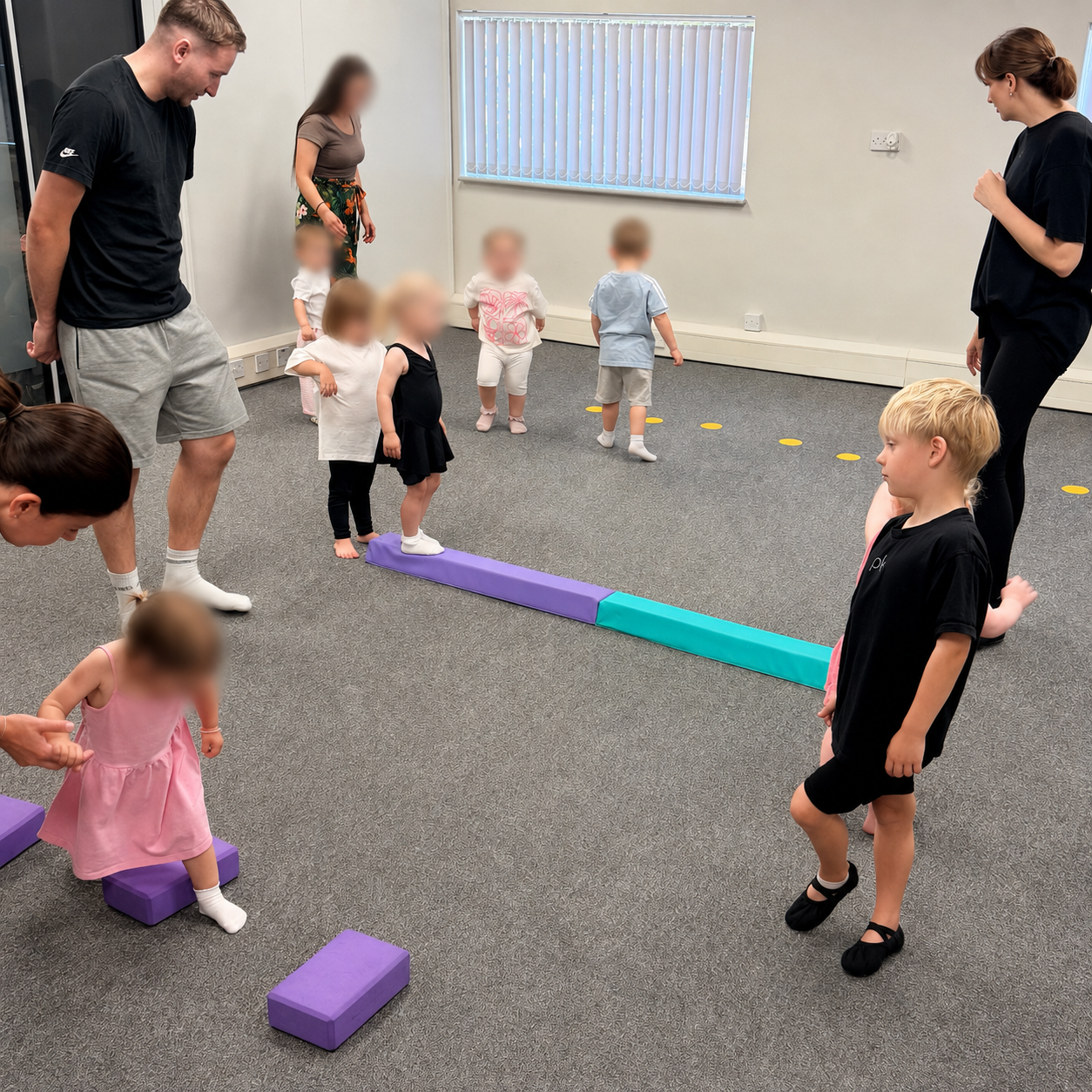 A toddler enjoying a movement class
